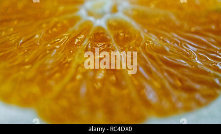 Orange - Fruchtfleisch, Makro Foto, geringe Tiefenschärfe. Orange Textur Stockfoto