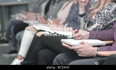 Business Group Notizen in chatinhalt sitzen in die Konferen Stockfoto