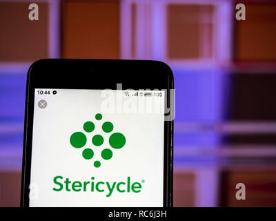 Kiew, Ukraine. 14 Jan, 2019. Stericycle Firmenlogo gesehen auf einem Smartphone angezeigt. Quelle: Igor Golovniov/SOPA Images/ZUMA Draht/Alamy leben Nachrichten Stockfoto