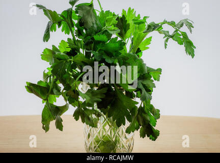 Herby Petersilie in einer klaren Glas. Stockfoto