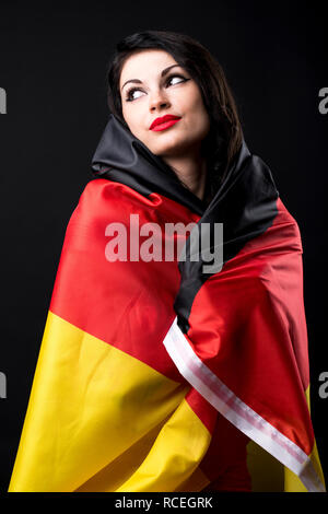 Trauernde Germanium, deckt eine junge deutsche Frau ihr Gesicht hand Stockfoto