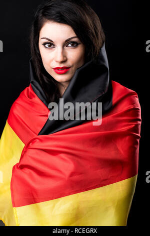 Trauernde Germanium, deckt eine junge deutsche Frau ihr Gesicht hand Stockfoto