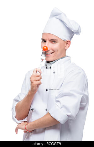 Köche mit Cherry Tomaten auf eine Gabel, Schuß auf einen weißen Hintergrund im Studio Stockfoto