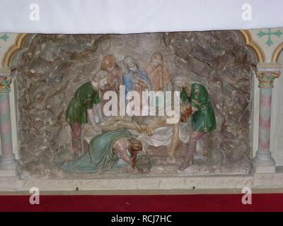 Alembon (Pas-de-Calais) Église, Relief mise au tombeau. Stockfoto