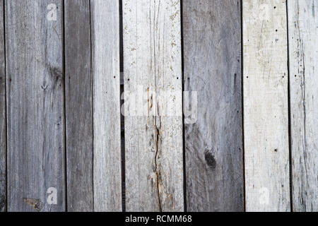 Wand aus alten grauen verblasst Holz Bretter Stockfoto