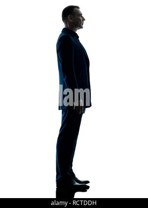 eine kaukasische Business Mann stehend Silhouette isoliert auf weißem Hintergrund Stockfoto