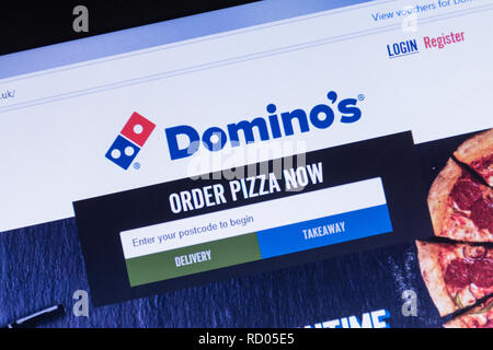 Domino's Pizza Website Screenshot auf Laptop Computer. Anzeige für Takeaway fast food Stockfoto