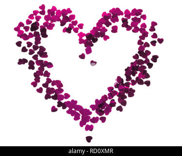 Herz Silhouette aus rotem Konfetti. Valentines card Stockfoto