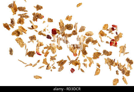 Fallende Cornflakes und Obst auf weißem Hintergrund Stockfoto