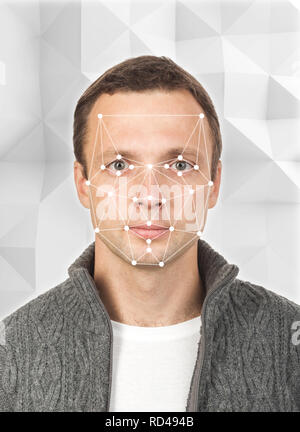 Porträt der jungen europäischen Mann mit Gesichtserkennung system Grid über Gesicht Stockfoto