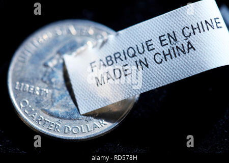 Label Made in China und USA Münze, Etikett Made in China und US-Münze Stockfoto