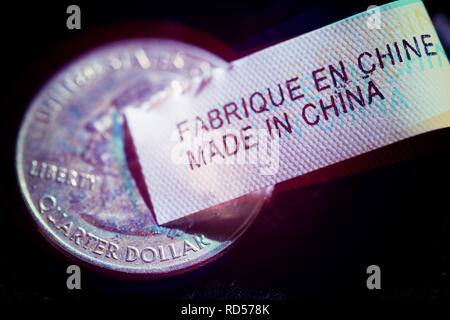 Label Made in China und USA Münze, Etikett Made in China und US-Münze Stockfoto