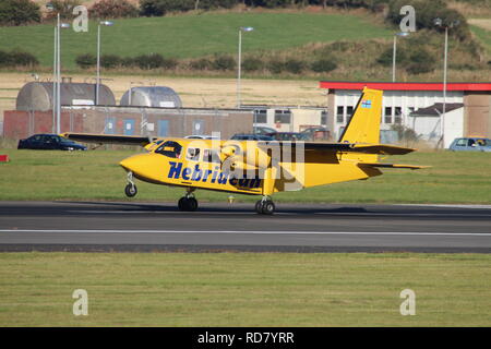 G-HEBO, eine Britten-Norman BN-2B Islander betrieben von der Hebriden, Dienstleistungen, Durchführung Rundflüge am Flughafen Prestwick, Ayrshire. Stockfoto