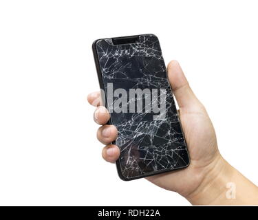 Mann mit einem schwarzen mobile Telefon und Bildschirm kaputt auf einem weißen Hintergrund. Stockfoto