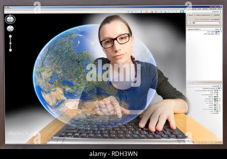 Junge Frau an einem Computer beim Surfen im Internet, Anzeigen von Google Earth, aus dem Computer, symbolische Bild Stockfoto