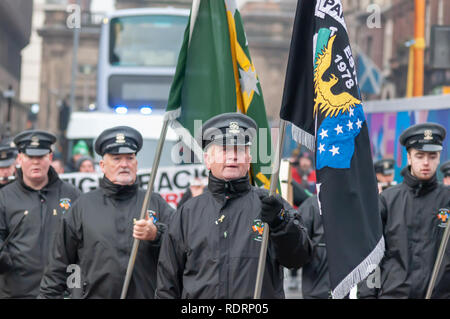 Glasgow, Schottland, Großbritannien. 19. Januar, 2019. Mitglieder des Westlich von Schottland Band Allianz Marsch durch die Straßen der Stadt. Im Jahr 1979 bildeten Sie sind die älteste Republikanische marching Organisation in Schottland und die Errichtung einer 32 Grafschaft sozialistischen Republik Irland zu fördern. Die heutige März ist der Blutige Sonntag, März für Justiz berechtigt. Credit: Skully/Alamy leben Nachrichten Stockfoto