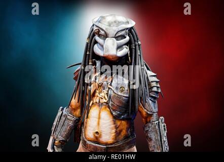 Birmingham, Großbritannien - 17 März, 2018. Männliche comicon Ventilator gekleidet wie Twentieth Century Fox, Predator in Cosplay Kostüme zu einem Comic Convention. Stockfoto