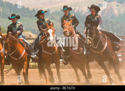 Cowboys und Cowgirls konkurrieren auf dem Dach der Welt, dem Rodeo Stockfoto