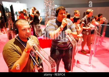 Sony PlayStation Singstar Karaoke singen Spiel, stand auf der Entertainment Bereich der Gamescom, der weltweit größten Messe für Stockfoto