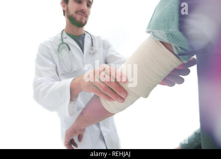 Orthopäde beruhigt seine Patientin. Stockfoto