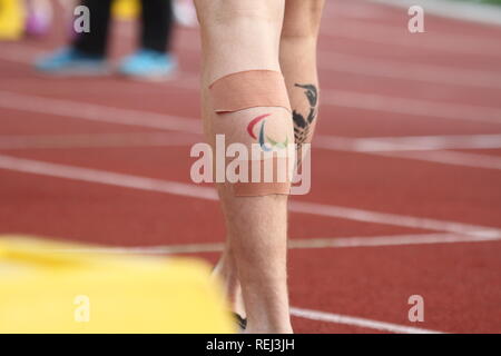 Ein Athlet mit einem IPC (International Paralympic Committee) Tattoo bereitet die Rennen während Para Leichtathletik Europameisterschaften. Credit: Ben Stand Stockfoto