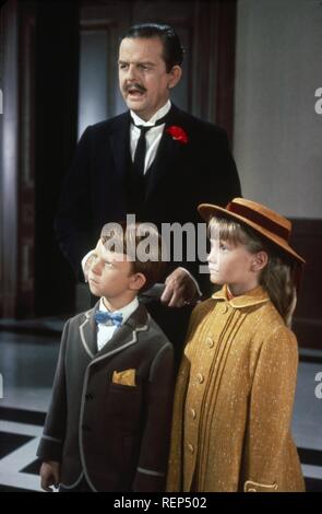 Mary Poppins Jahr: 1964 USA Regie: Robert Stevenson David Tomlinson, Karen Dotrice, Matthew Garber Stockfoto