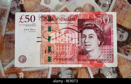 Bank von England £ 50 Hinweis mit dem neuen Polymer £ 10 Banknoten im Hintergrund Stockfoto