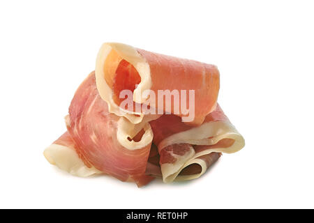 Scheiben Schinken Jamón gefaltet auf Weiß Stockfoto