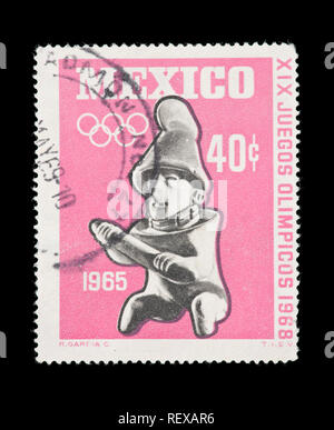 Briefmarke aus Mexiko zeigen einen Teig, Figur aus Ton von COlima ca. 300-650 N.CHR. für die Olympischen Spiele 1968 in Mexico City. Stockfoto