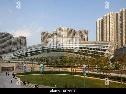 Insgesamt Seitenansicht am späten Nachmittag. West Bahnhof Kowloon, Hong Kong, China. Architekt: Andrew Bromberg Aedas, 2018. Stockfoto