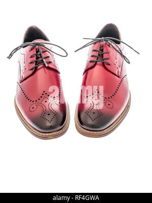 Ein Paar rote Flügel Kleidung Schuhe auf einem isolierten Hintergrund Stockfoto