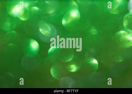 Grüne defokussierten flackernde Lichter für Text und Hintergrund. Stockfoto