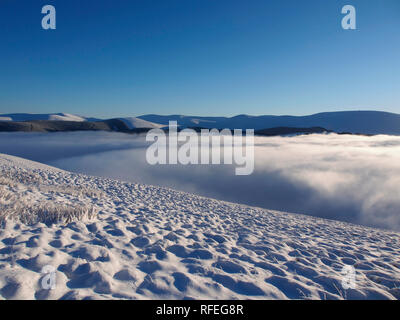 Cloud Inversion von Verschneiten Nether Oliver Dod, in der Nähe der Tweedsmuir, Southern Uplands, Schottland Stockfoto