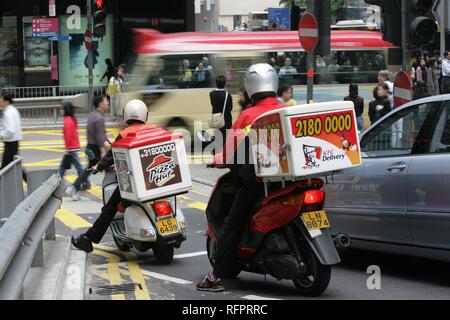 Hongkong Island, Lieferservice auf dem Fahrrad, Pizza Hut, KFC, Honkong, China Stockfoto