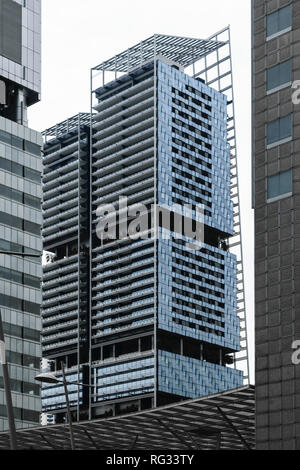 Singapur - 14 Okt 2018. Modern und futuristisch anmutende Wolkenkratzer im Geschäftsviertel Singapur Mitte bei bewölkten und regnerischen Tag. Schöne contras Stockfoto