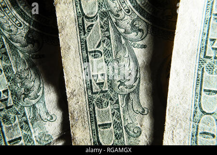 Dollar USA close-up. Alte zerschlagen zerknitterte scheine Makro. Die Textur der Fragment der Dollar Bill. USD banknote Textur. Stockfoto