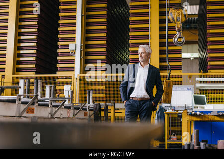 Erfolgreiche Unternehmer in seinem Unternehmen Stockfoto