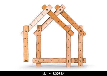 Holz- falten inch Lineal in der Form von zwei Häusern. Auf weissem Hintergrund. Beschneidungspfad enthalten. Stockfoto