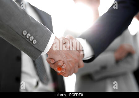 Hintergrundbild von Handshake von Geschäftsleuten. Stockfoto