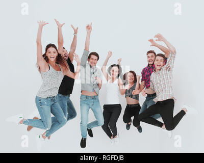 Triumphierend Gruppe junger Menschen Stockfoto