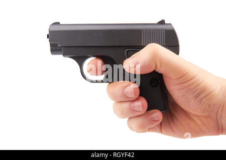 Die weiße Hand hält Gewehr auf weißem Hintergrund. Stockfoto