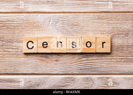 Censor Wort auf Holz Block geschrieben. Censor text auf Holz- Tabelle für Ihr Design, Konzept. Stockfoto