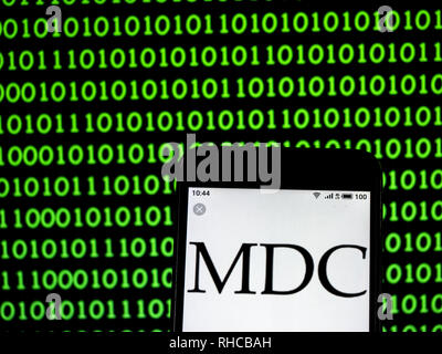 Kiew, Ukraine. 2 Feb, 2019. MDC Holdings Company Logo gesehen auf einem Smartphone angezeigt. Quelle: Igor Golovniov/SOPA Images/ZUMA Draht/Alamy leben Nachrichten Stockfoto