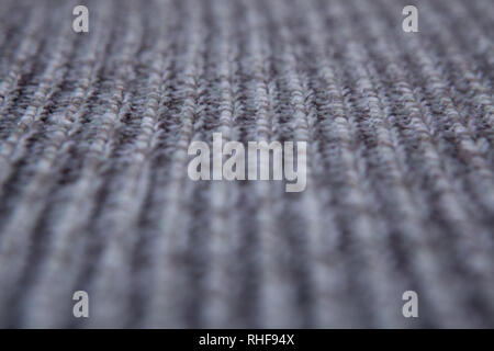 Stricken nahtlose Muster. Grauer wolle Hintergrund. Alte Handarbeit stricken. Stockfoto