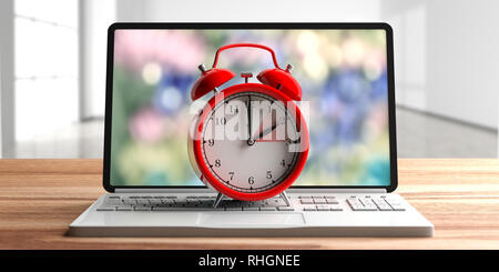Europäische Sommerzeit Ende rot Wecker auf einem Computer Laptop auf dem Schreibtisch aus Holz. 3D-Darstellung Stockfoto