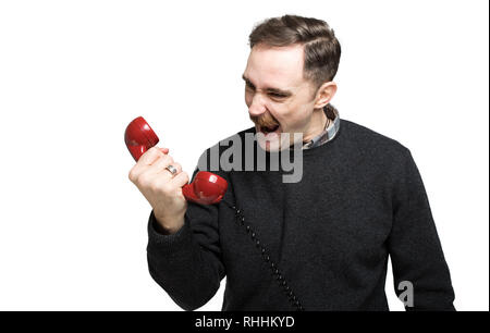 Zornigen mann Schreien am Telefon Stockfoto