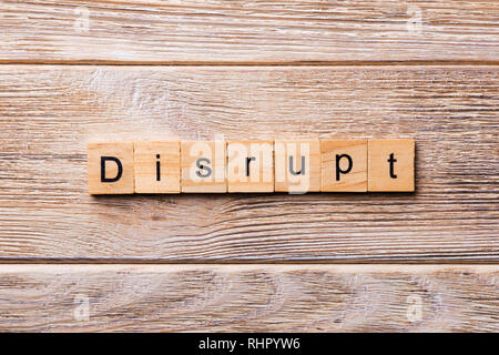 Stören Wort auf Holz Block geschrieben. Stören text auf Holz- Tabelle für Ihr Design, Konzept. Stockfoto