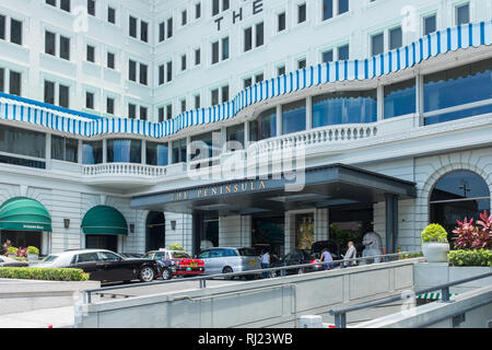 Eingang des Peninsula Hotel Hong Kong Stockfoto