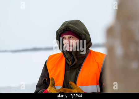 Porträt der Installer im orange Warnweste Stockfoto