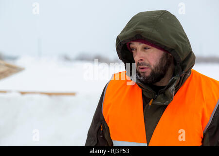 Porträt der Installer im orange Warnweste Stockfoto